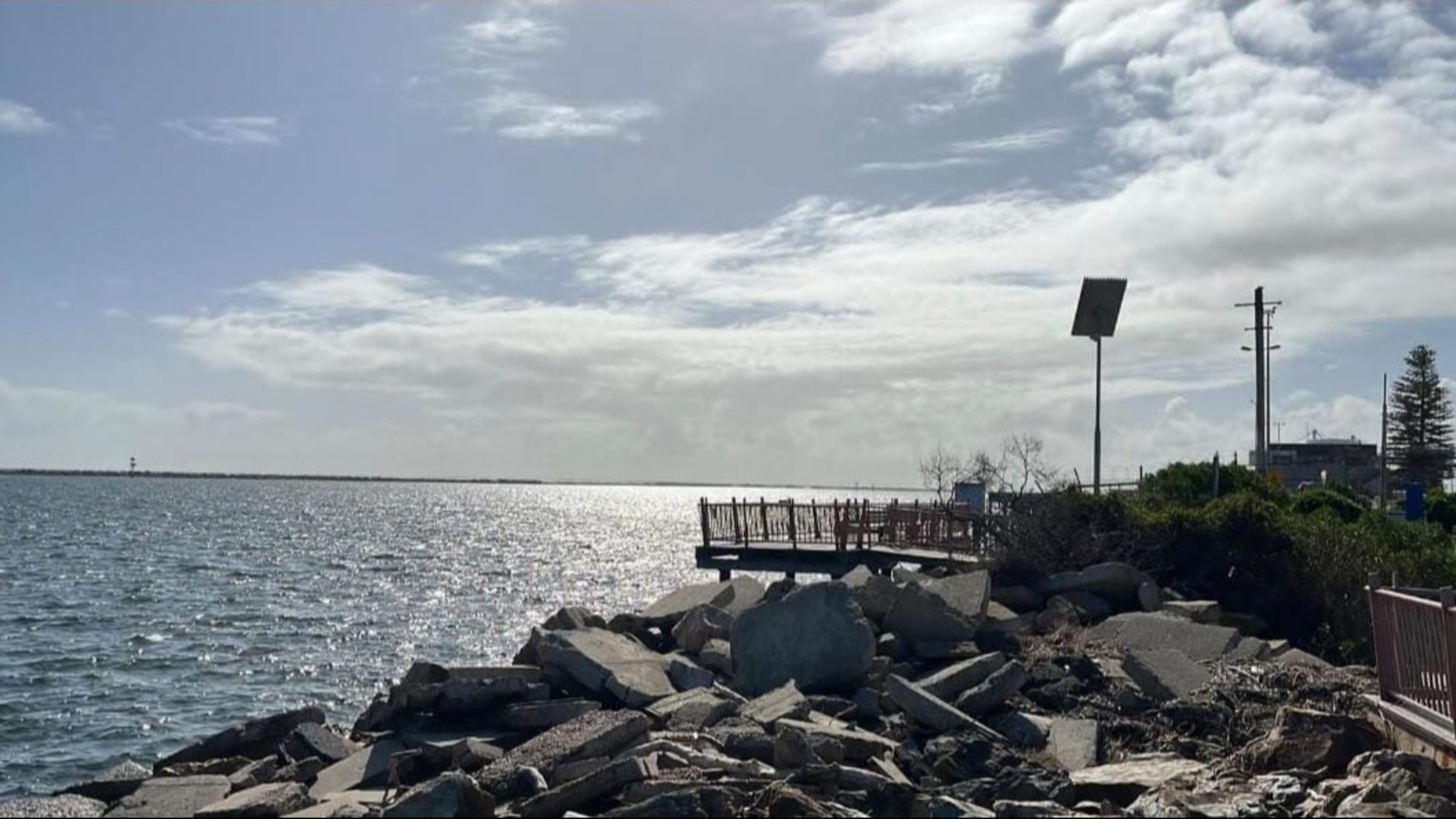 The rocks may seem broken, but the sunlight dances boldly across the waves, reminding us that beauty thrives at the edge of c...